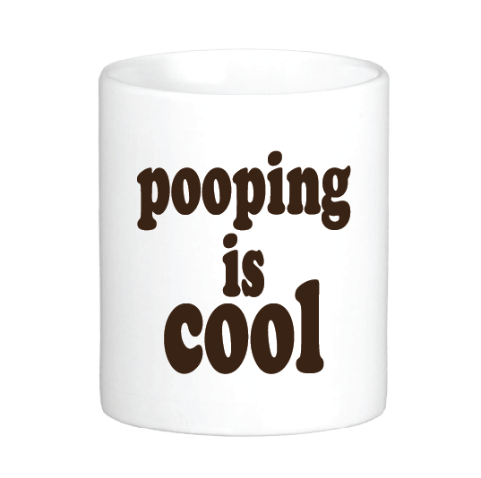 coffee mug with the slogan pooping is cool