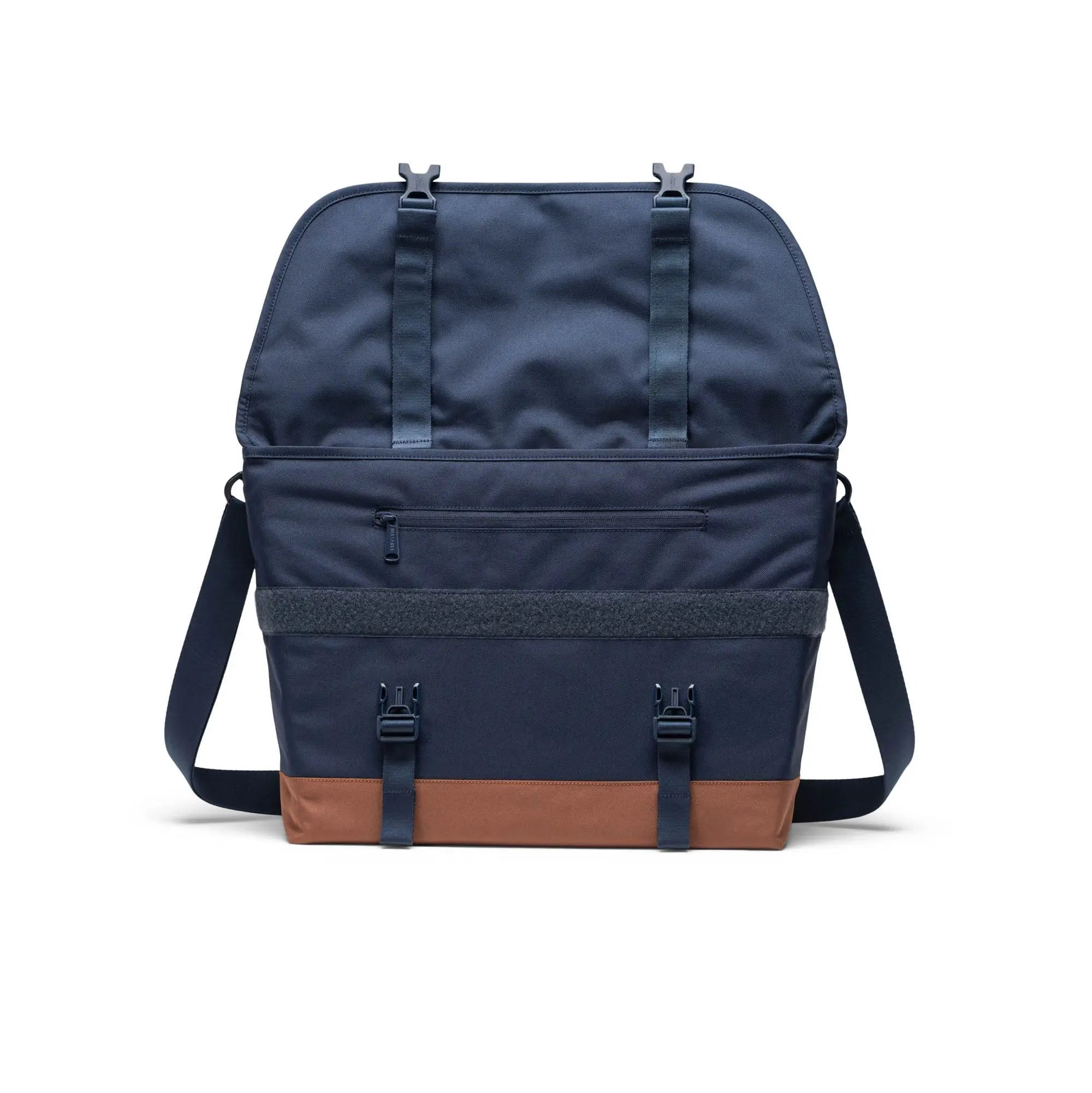 navy blue herschel cove mesesenger bag with tan bottom