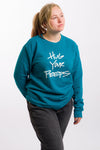 crew neck sweat shirt with the phrase Hug Your Peeps in white