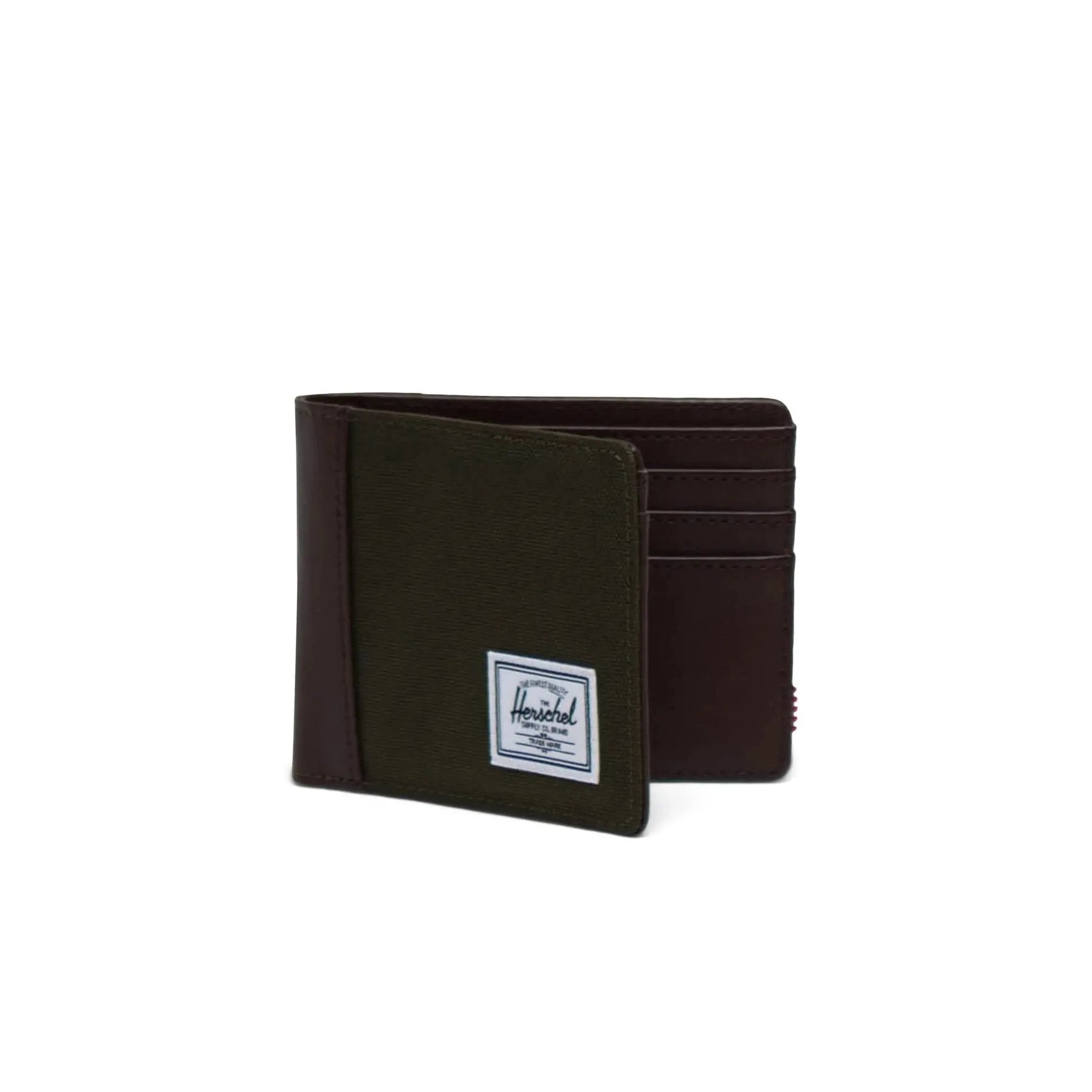 A Herschel Hank wallet in Ivy Green and Chicory Coffee colors with a visible brand label, multiple card slots, and a brown faux leather interior.