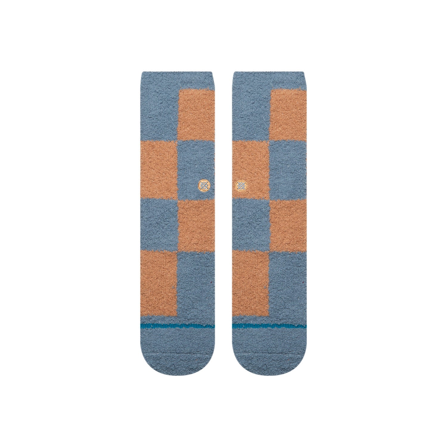 Pair of checkered stance patchwork cozy socks with blue and orange squares on a white background