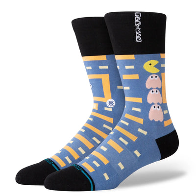 Socks with a Pac-Man maze-like pattern on it, complete with Pac-Man and three ghosts