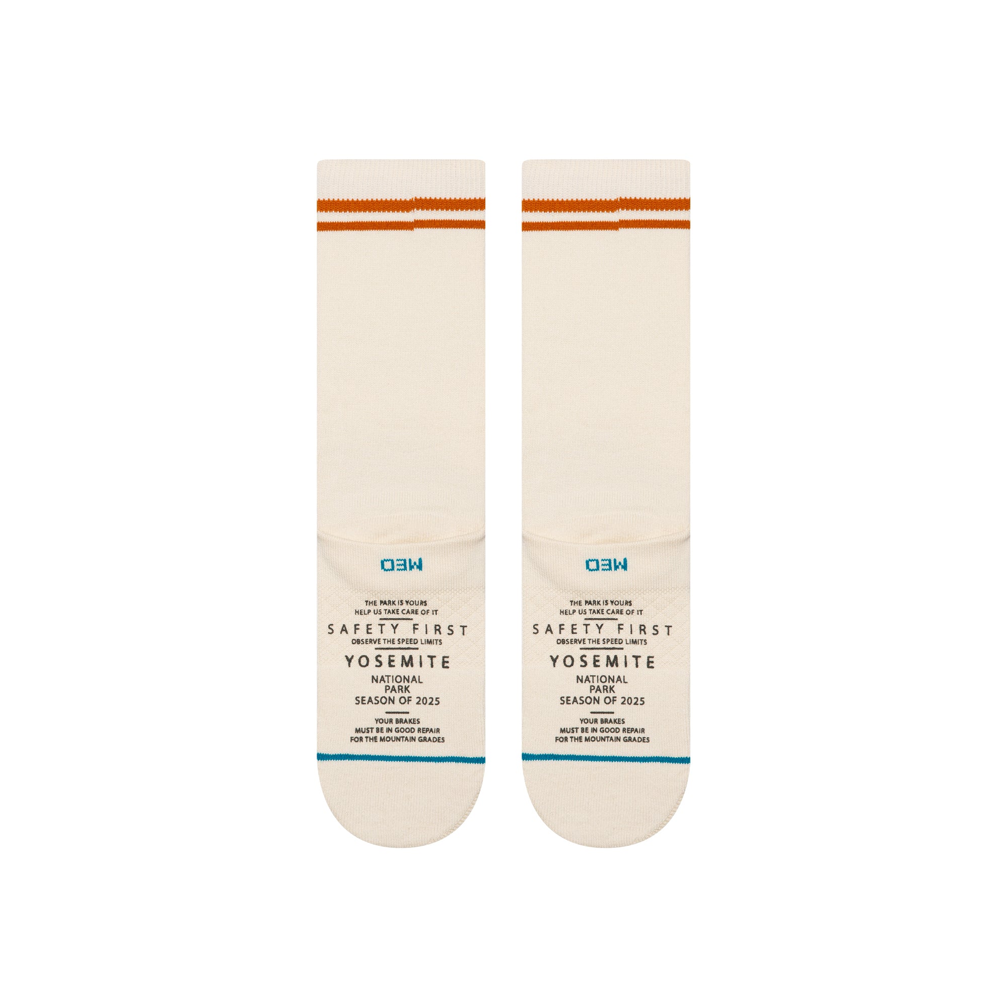 Pair of stance x national parks crew socks with Yosemite National Park design on a white background