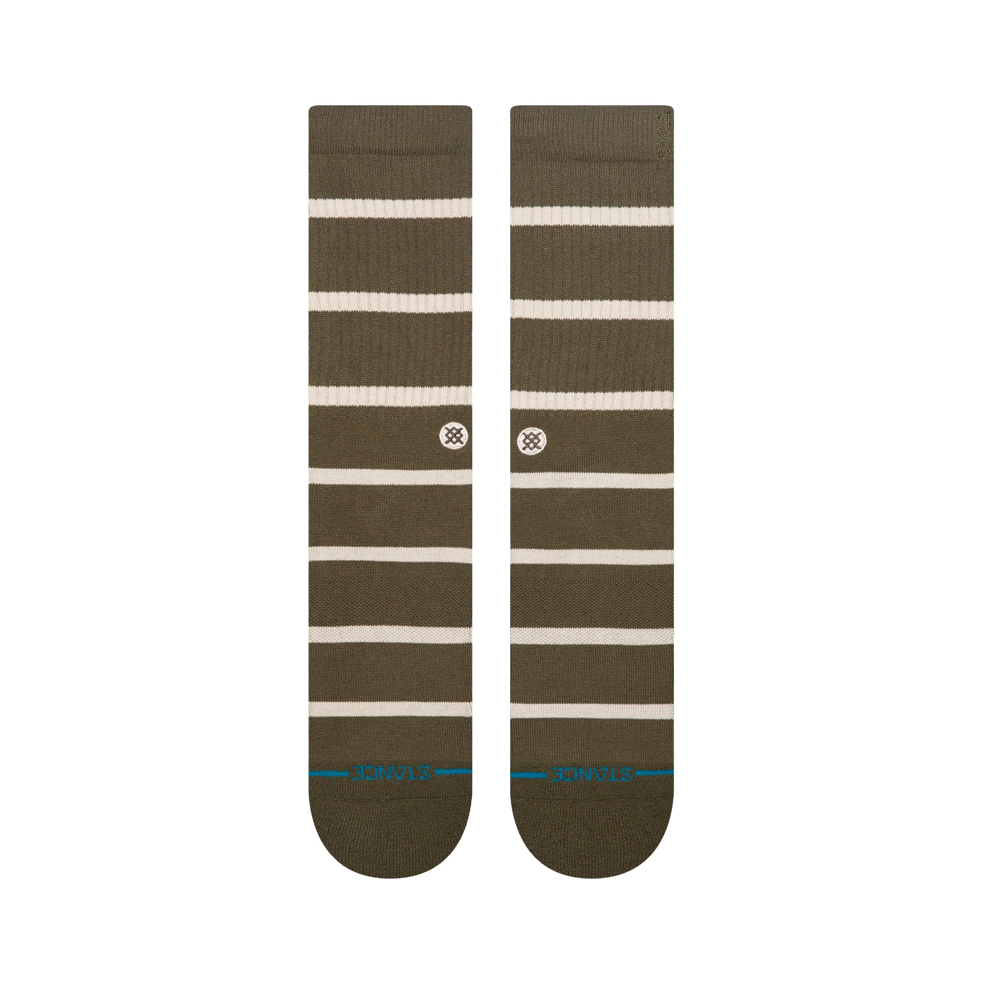 Pair of green stance butter blend crew socks with white stripes on a white background