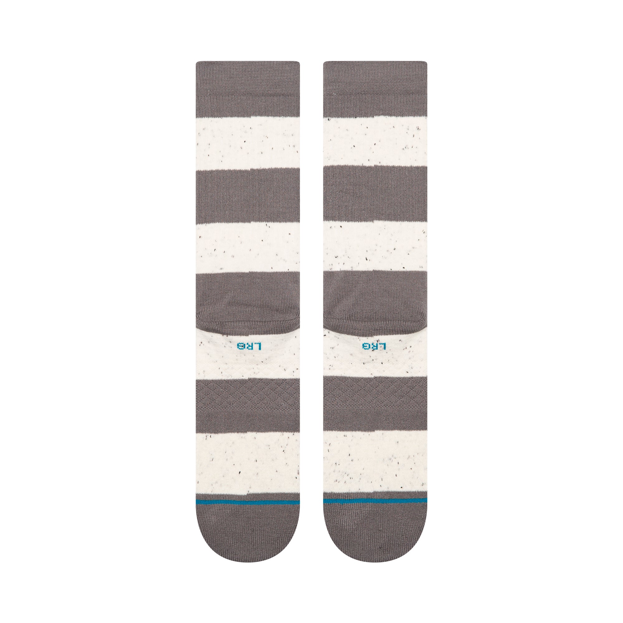 Pair of gray and white stance nep striped socks on a white background