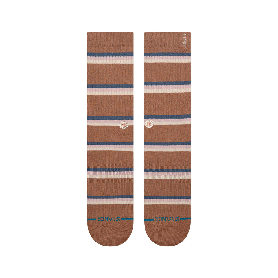 Pair of brown striped stance butter blend socks with a visible brand logo on a white background