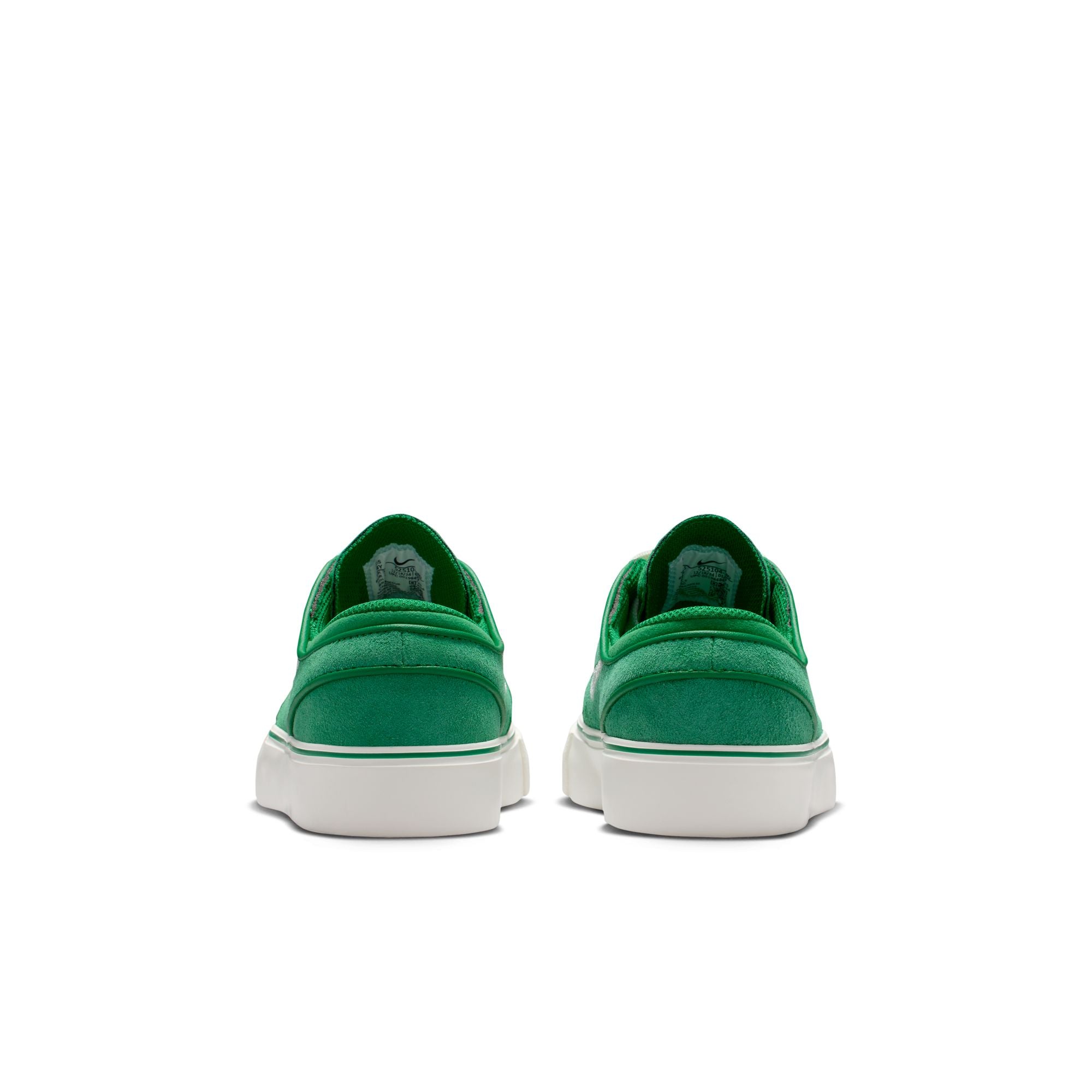Green big kids janoski sneaker with white Nike logo on a white background