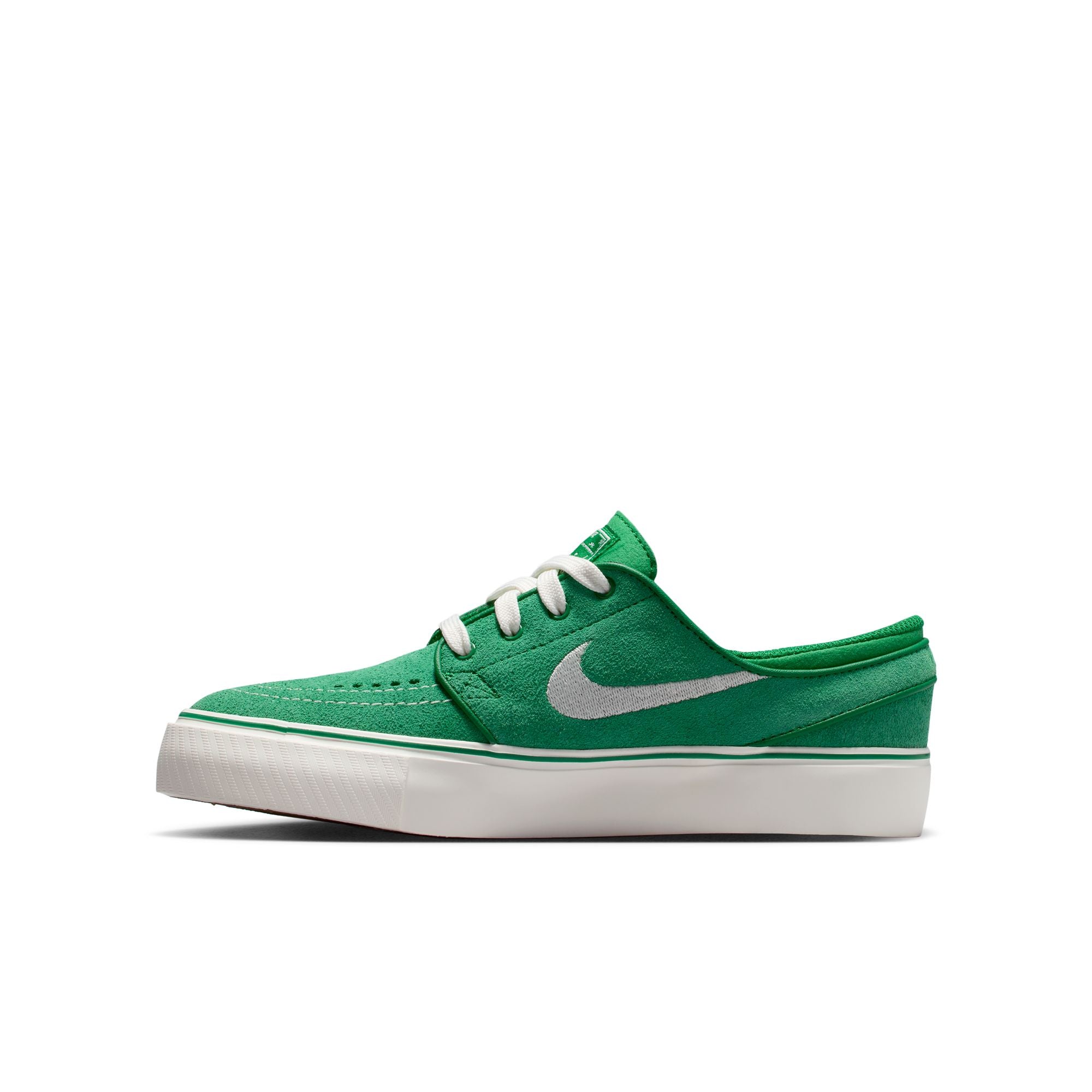 Green big kids janoski sneaker with white Nike logo on a white background