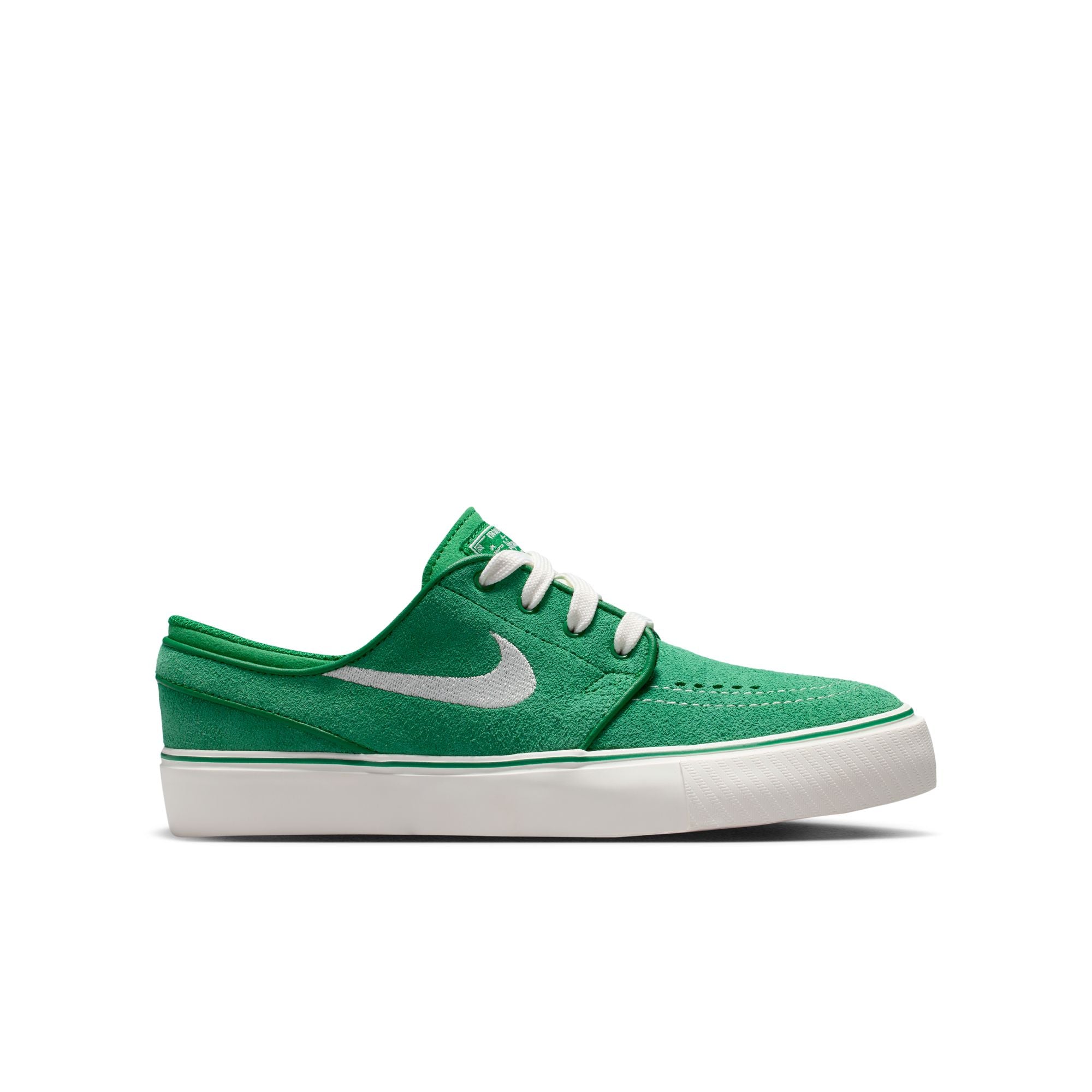 Green big kids janoski sneaker with white Nike logo on a white background