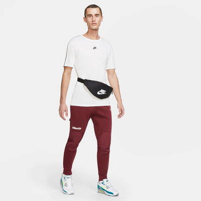 black nike waistpack with with nike logo