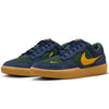 navy blue and green nike sb force 58 men's skateboard shoe with golden yellow nike swoosh and gum sole