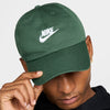 green nike dad hat with white logo