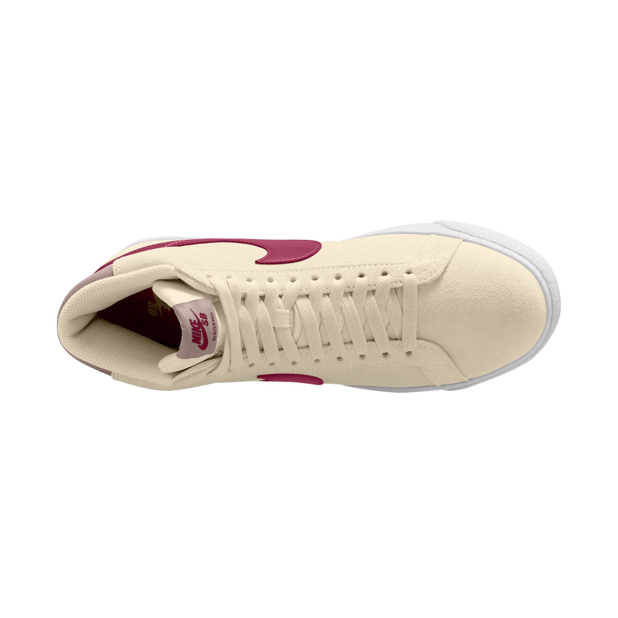Beige nike sb blazer mid skateboard sneaker with red swoosh logo on a white background