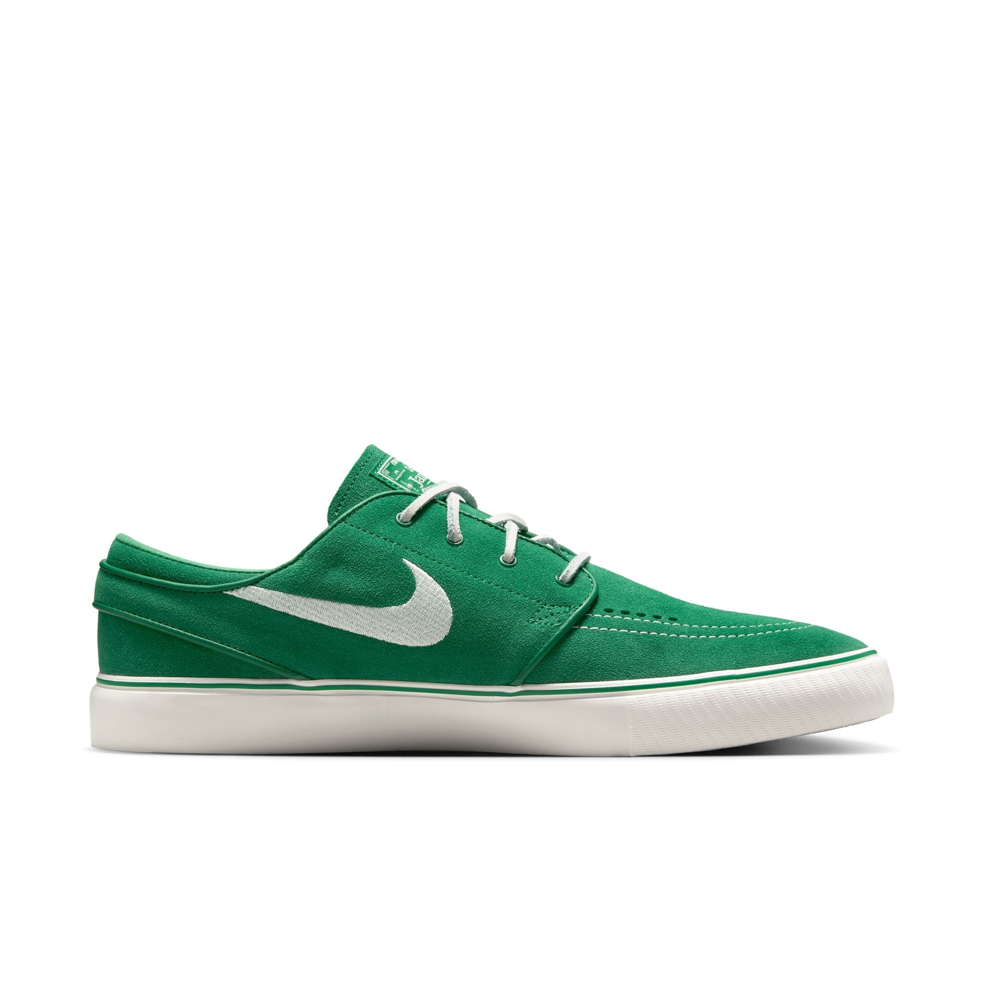 Green nike sb janoski skateboard sneaker with white swoosh logo on a white background