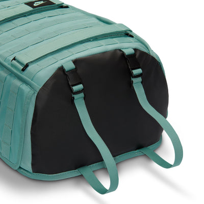Teal backpack with Nike logo on a white background