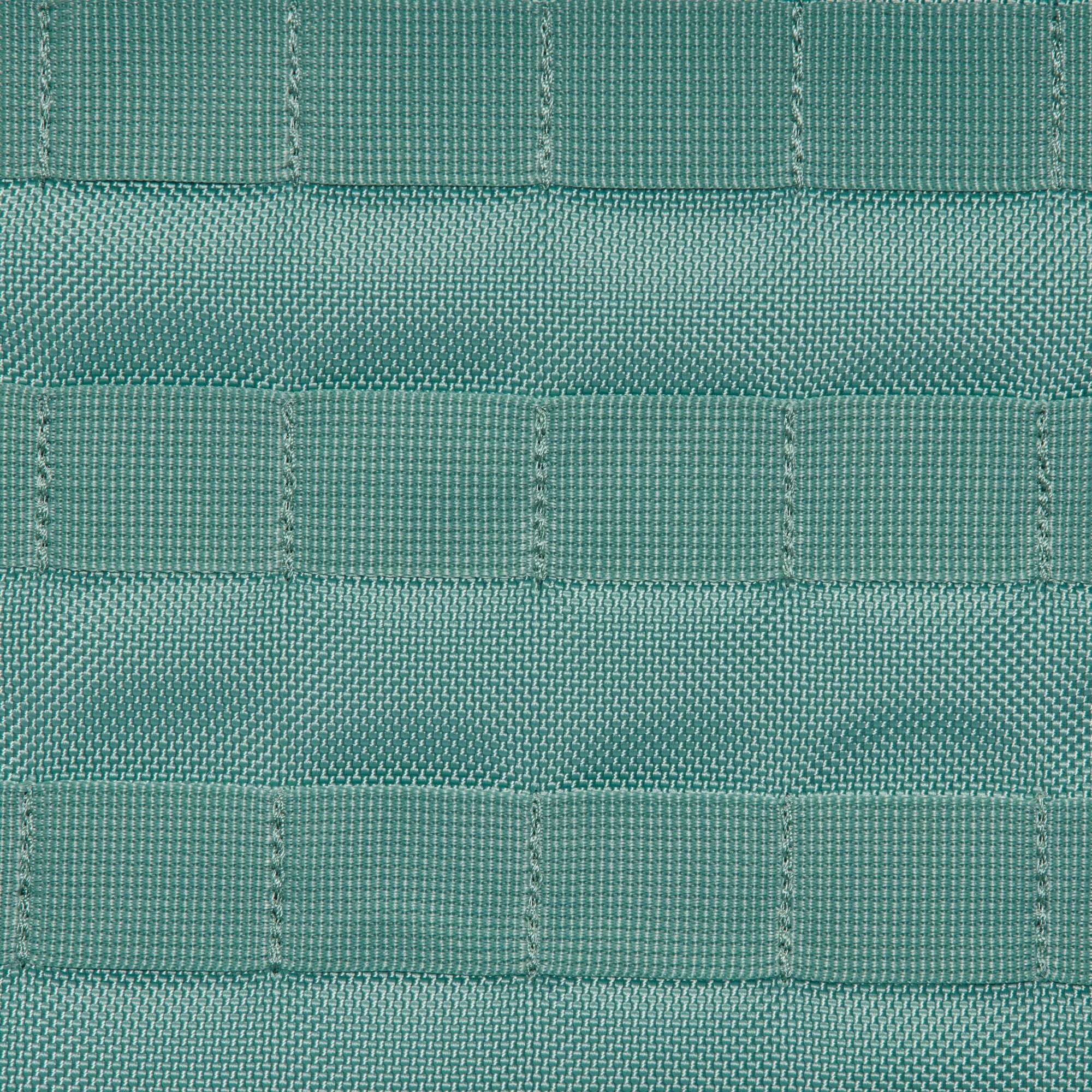 Teal backpack with Nike logo on a white background