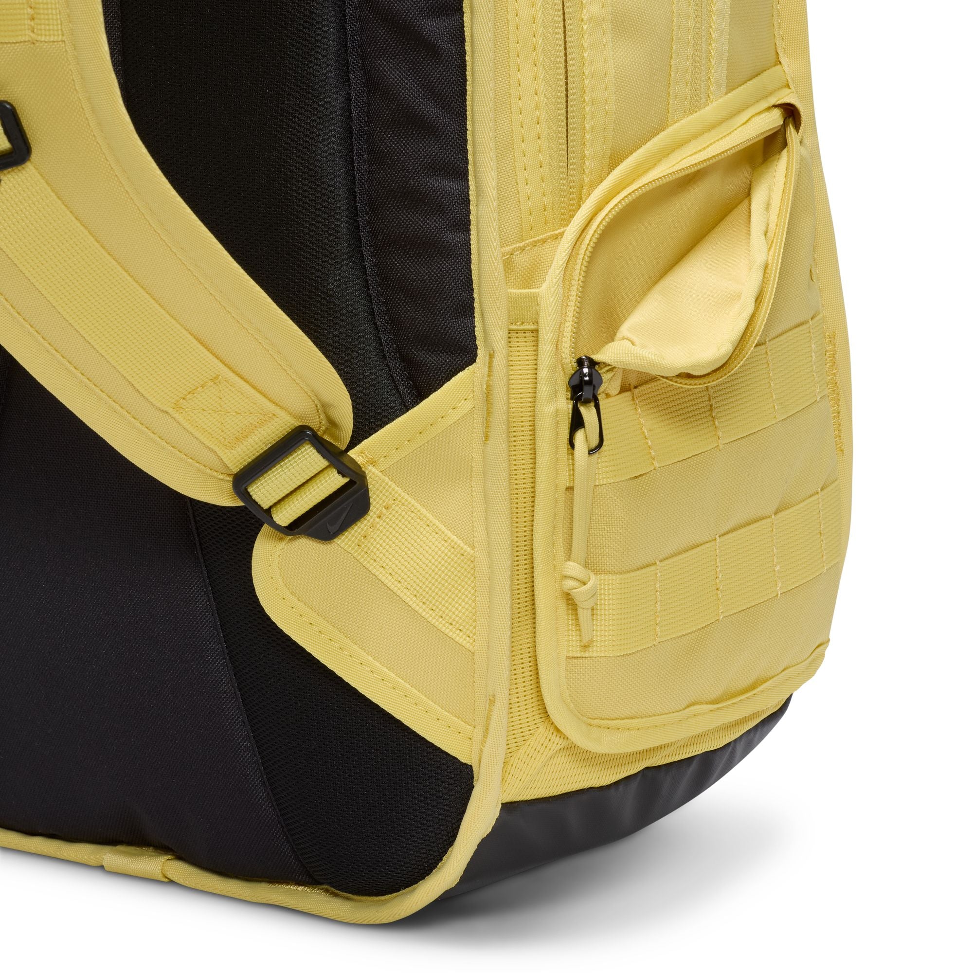 Yellow nike sb prm skate backpack with Nike logo on a white background