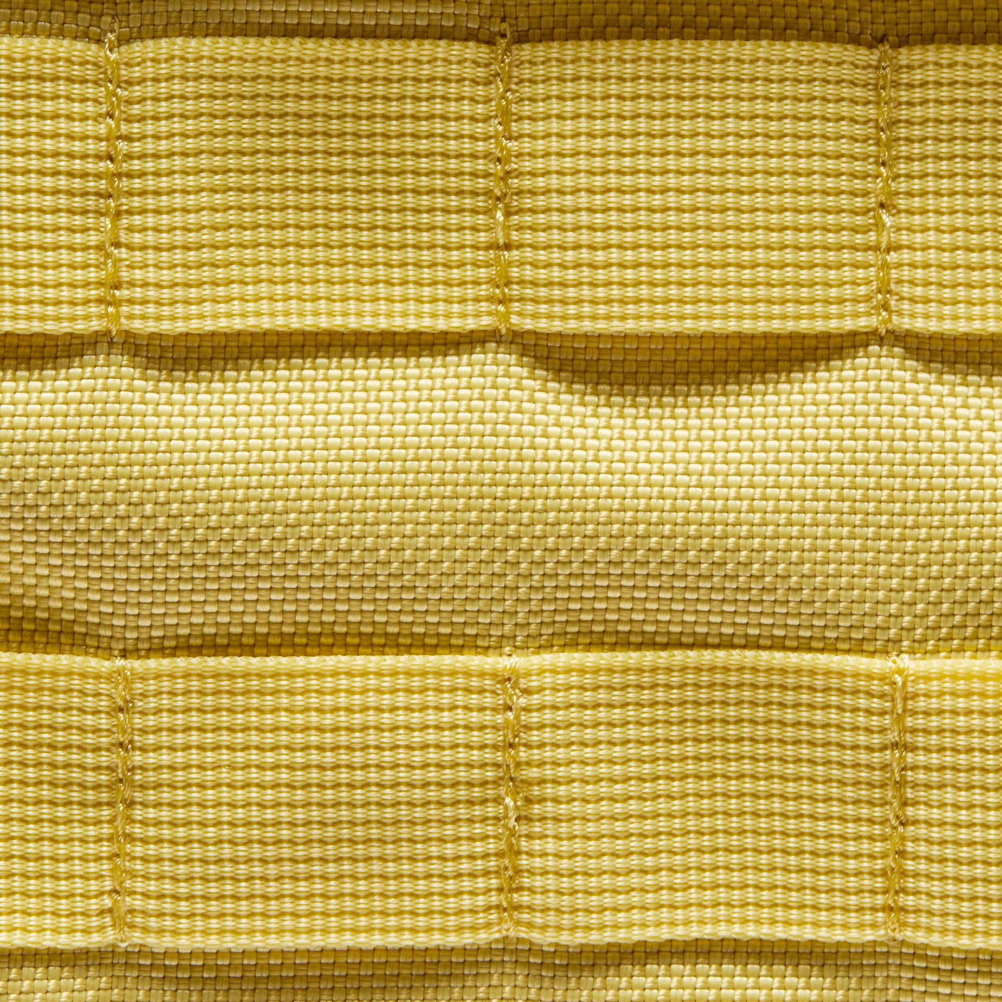 Yellow nike sb prm skate backpack with Nike logo on a white background