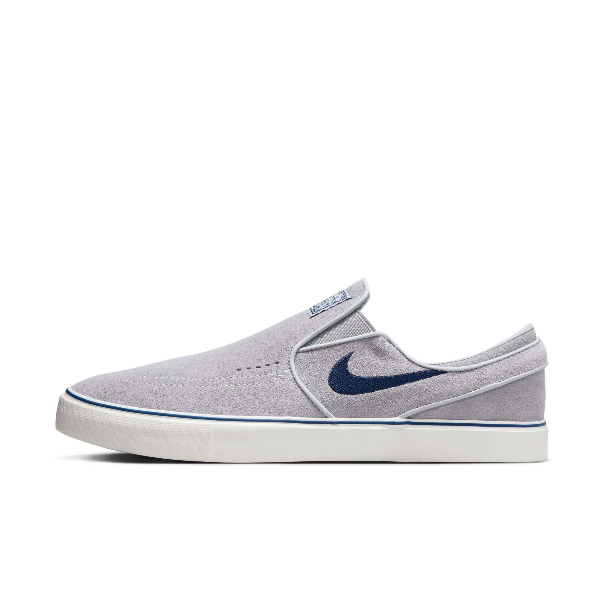 grey men's nike sb janoski slip-on with navy swoosh and white sole