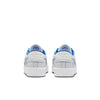 all white nike sb 20th anniversary grant taylor anniversary low top skate shoe with blue undertones and white sole