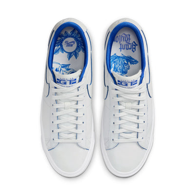 all white nike sb 20th anniversary grant taylor anniversary low top skate shoe with blue undertones and white sole