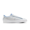 all white nike sb 20th anniversary grant taylor anniversary low top skate shoe with blue undertones and white sole