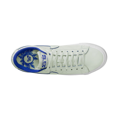 all white nike sb 20th anniversary grant taylor anniversary low top skate shoe with blue undertones and white sole