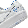 all white nike sb 20th anniversary grant taylor anniversary low top skate shoe with blue undertones and white sole