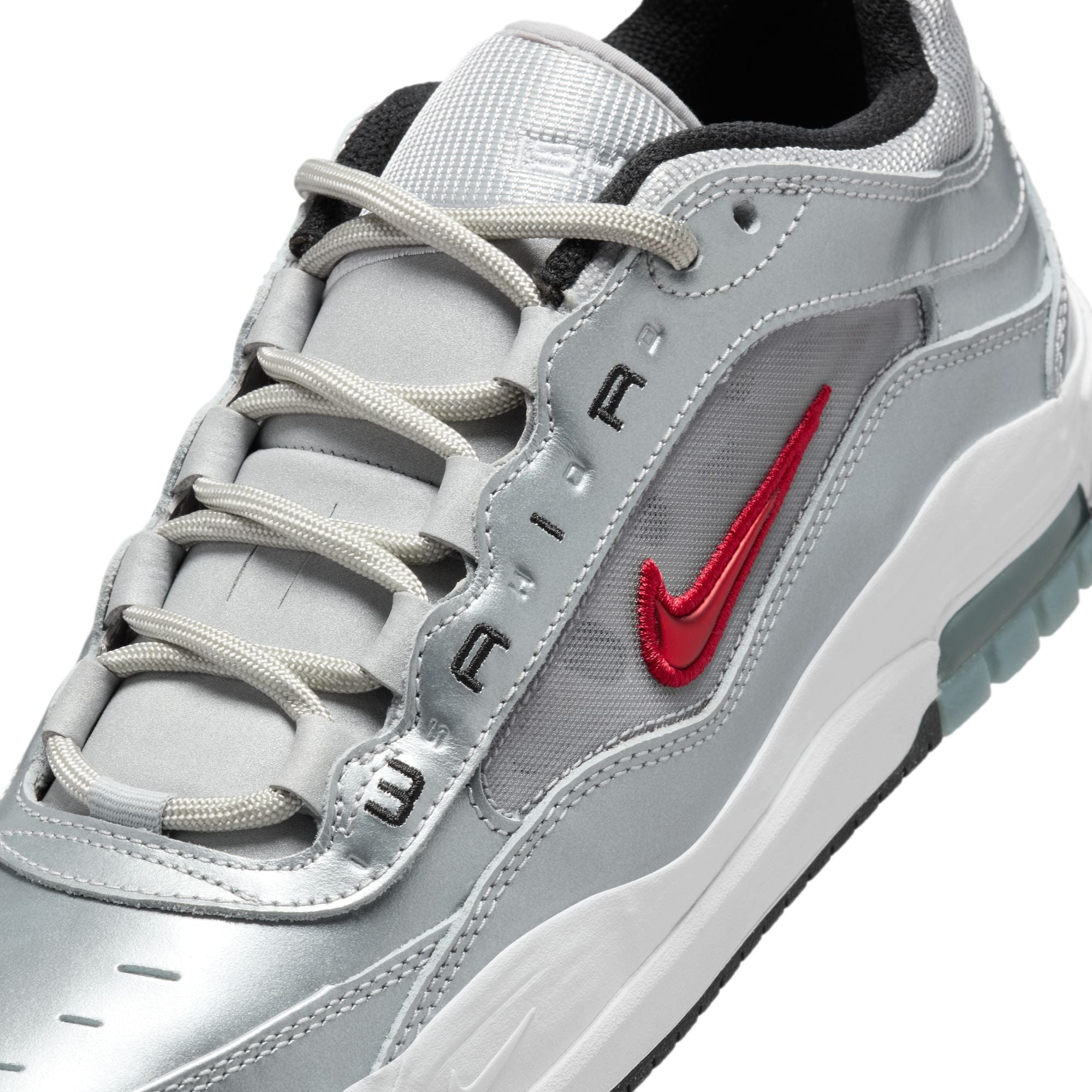 metallic silver nike sb ishod wair air max 2 skateboard shoe with red swoosh and white sole