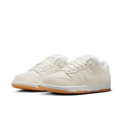 ivory nike sb dunk low with white and gum sole