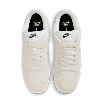 ivory nike sb dunk low with white and gum sole
