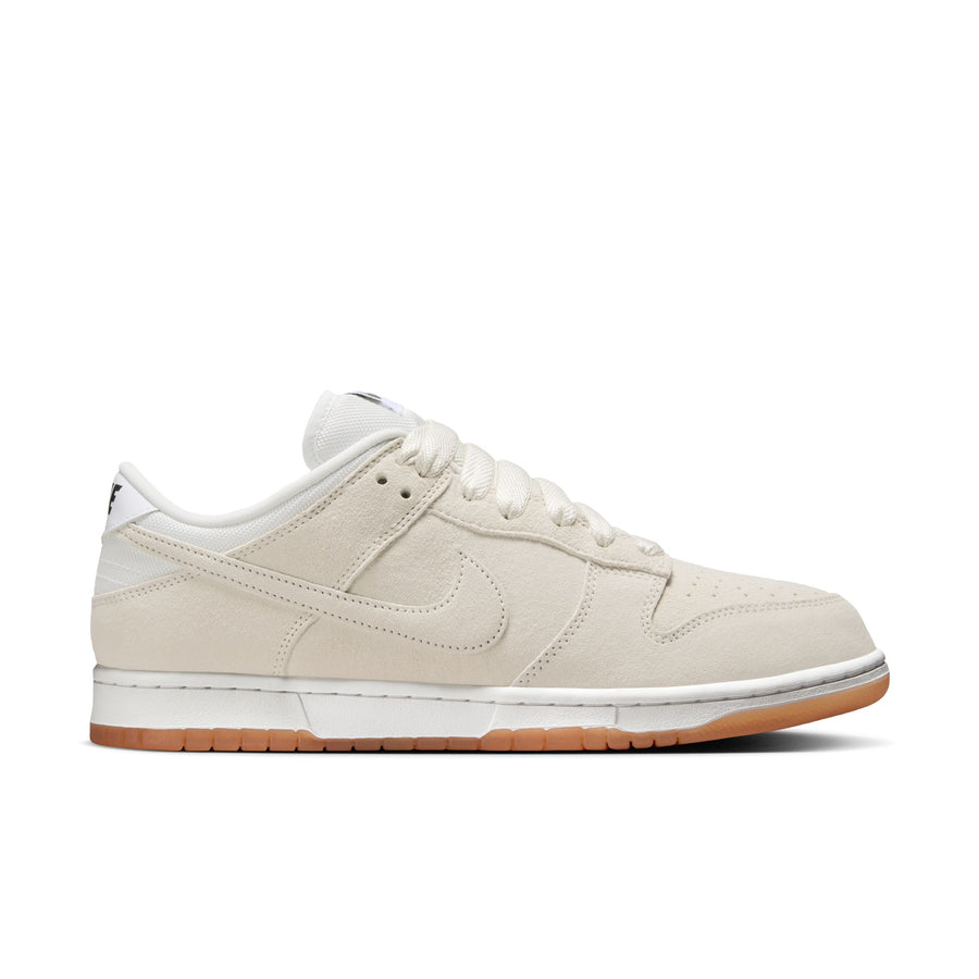 ivory nike sb dunk low with white and gum sole
