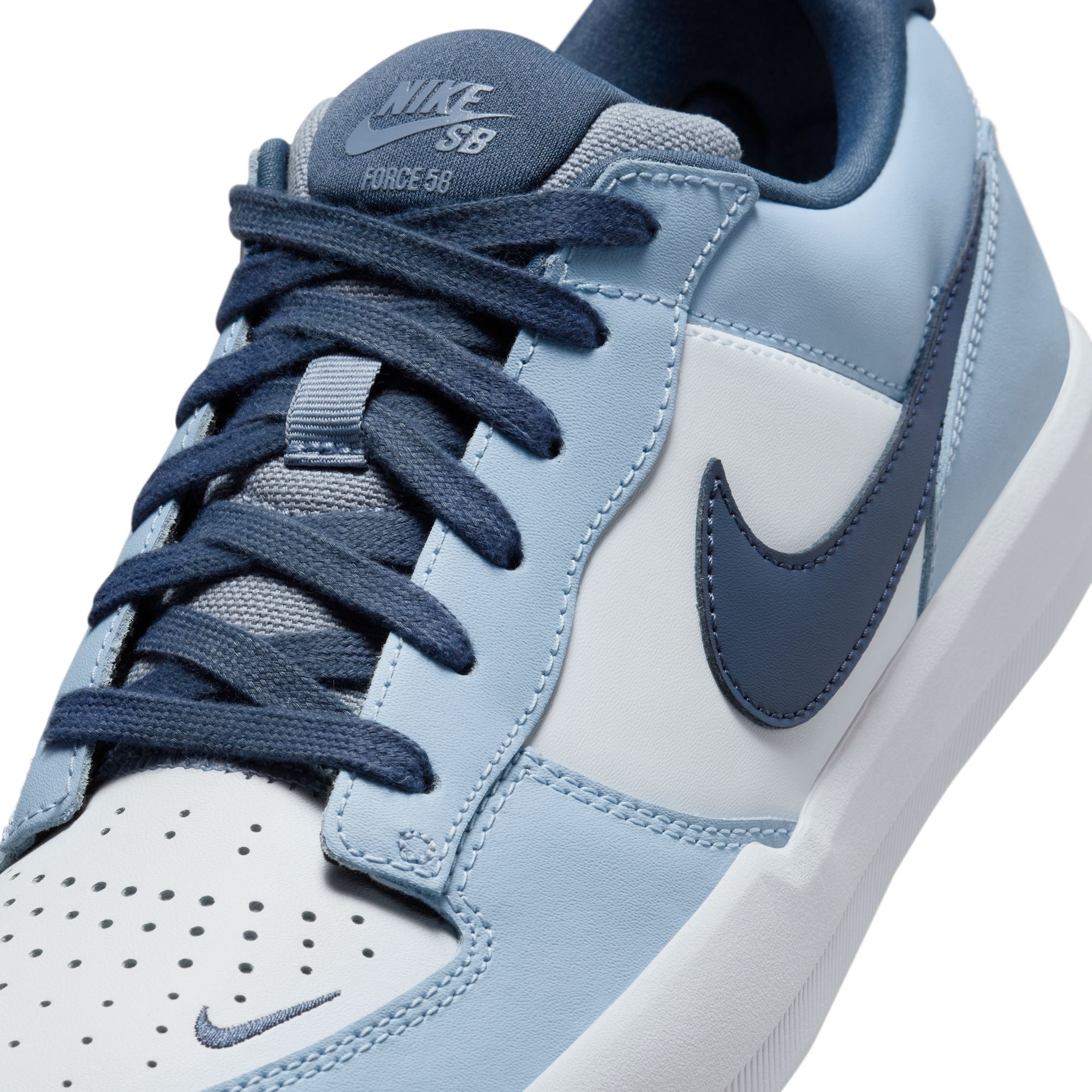Light Blue and white Nike sb force 58 premium skateboard sneaker with Nike logo on a white background
