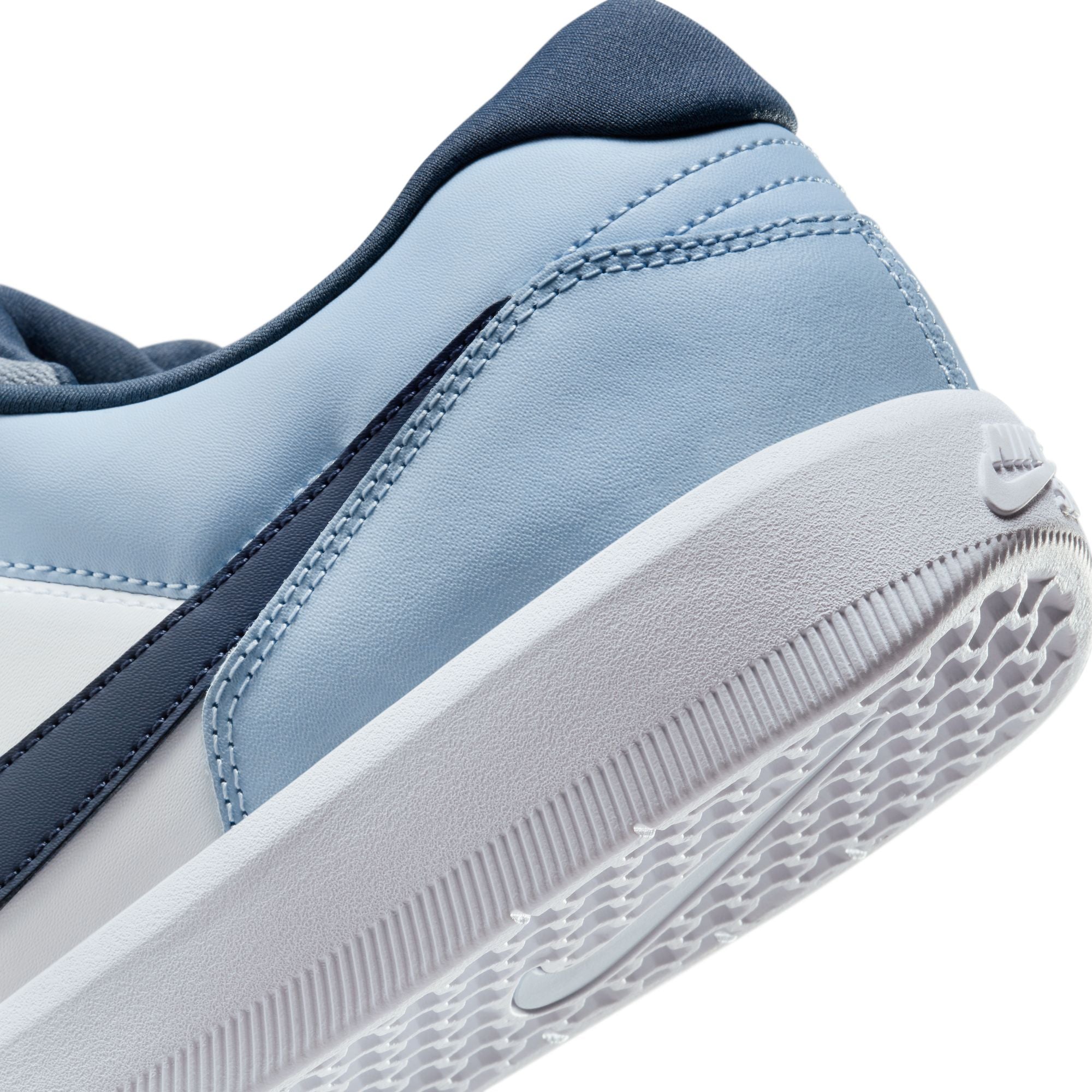 Light Blue and white Nike sb force 58 premium skateboard sneaker with Nike logo on a white background