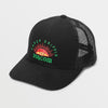 black volcom trucker hat that says earth tripper