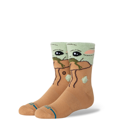 Pair of stance x star wars grogu fuzzy socks with on a white background