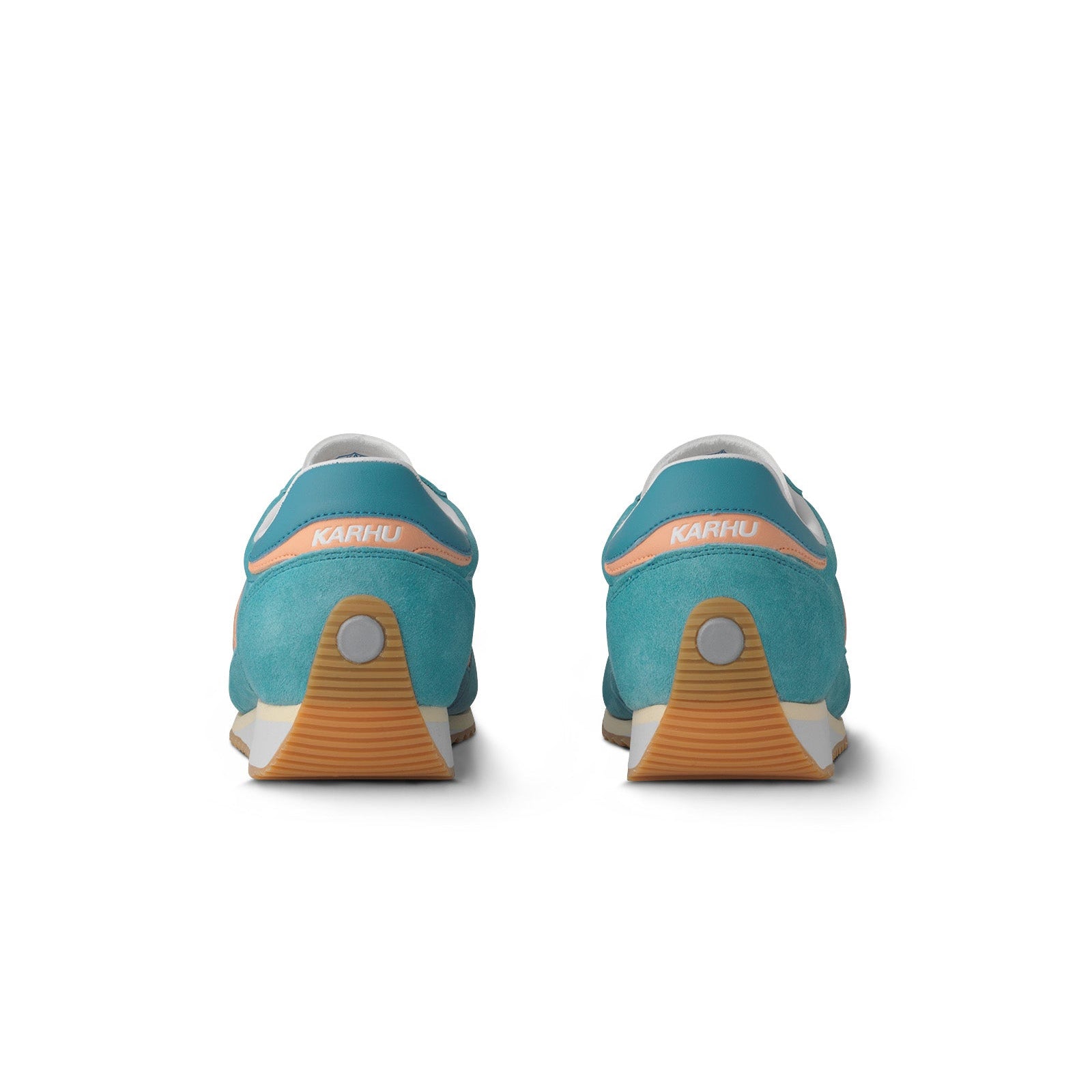 blue karhu mestari women's shoe with peach orange M logo and yellow and white sole