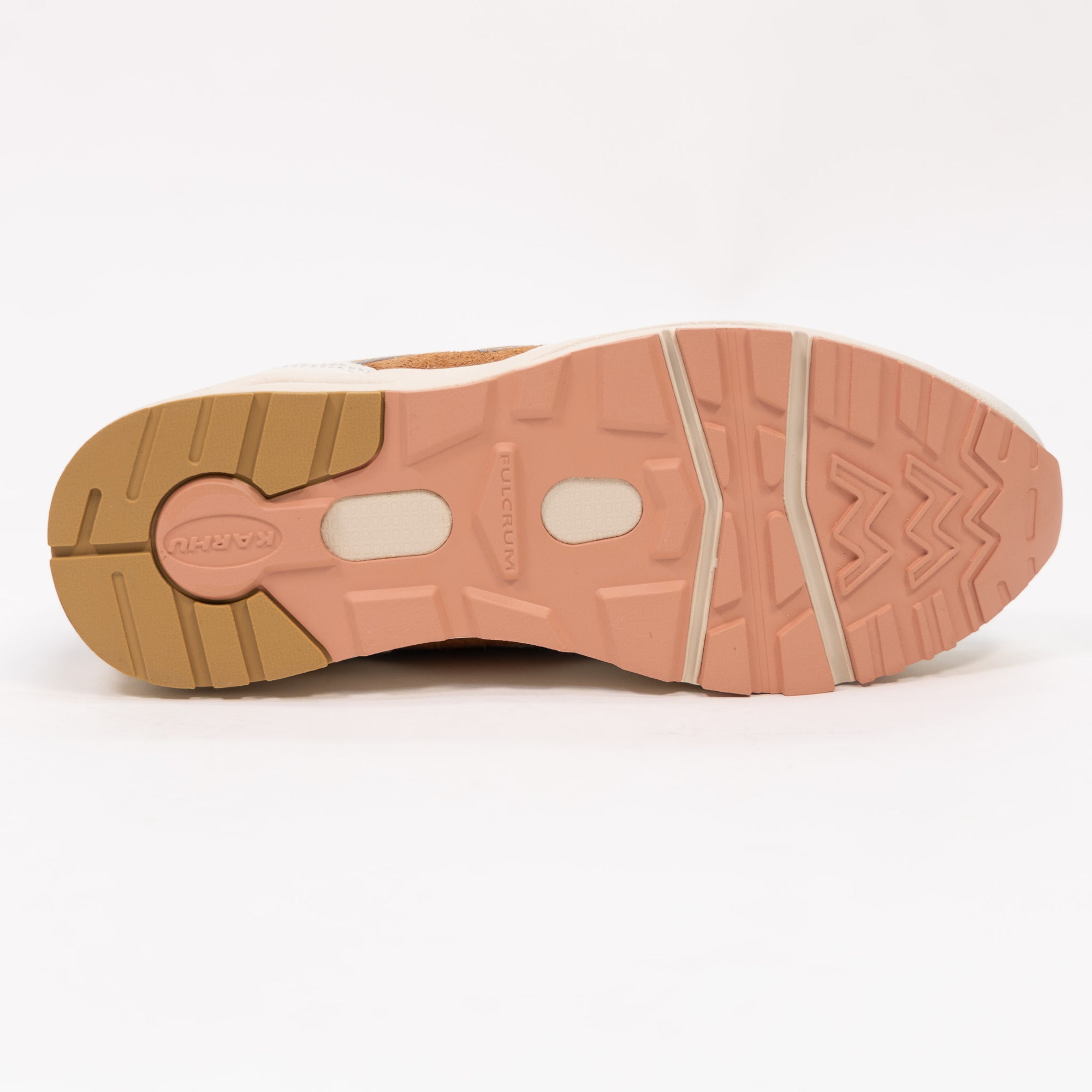 off white karhu women's comfort shoe with gold and orange detail