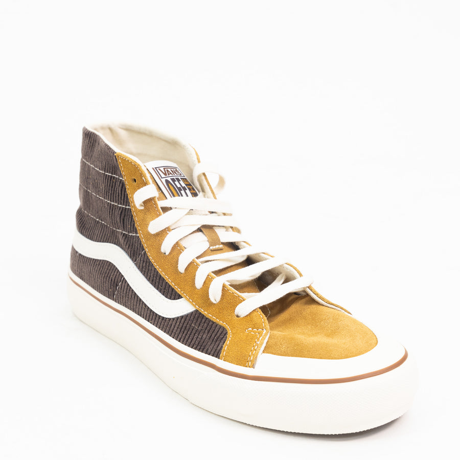 suede light brown vans sk8-hi high top women's shoe with dark brown corduroy side panel, white stripe and white sole