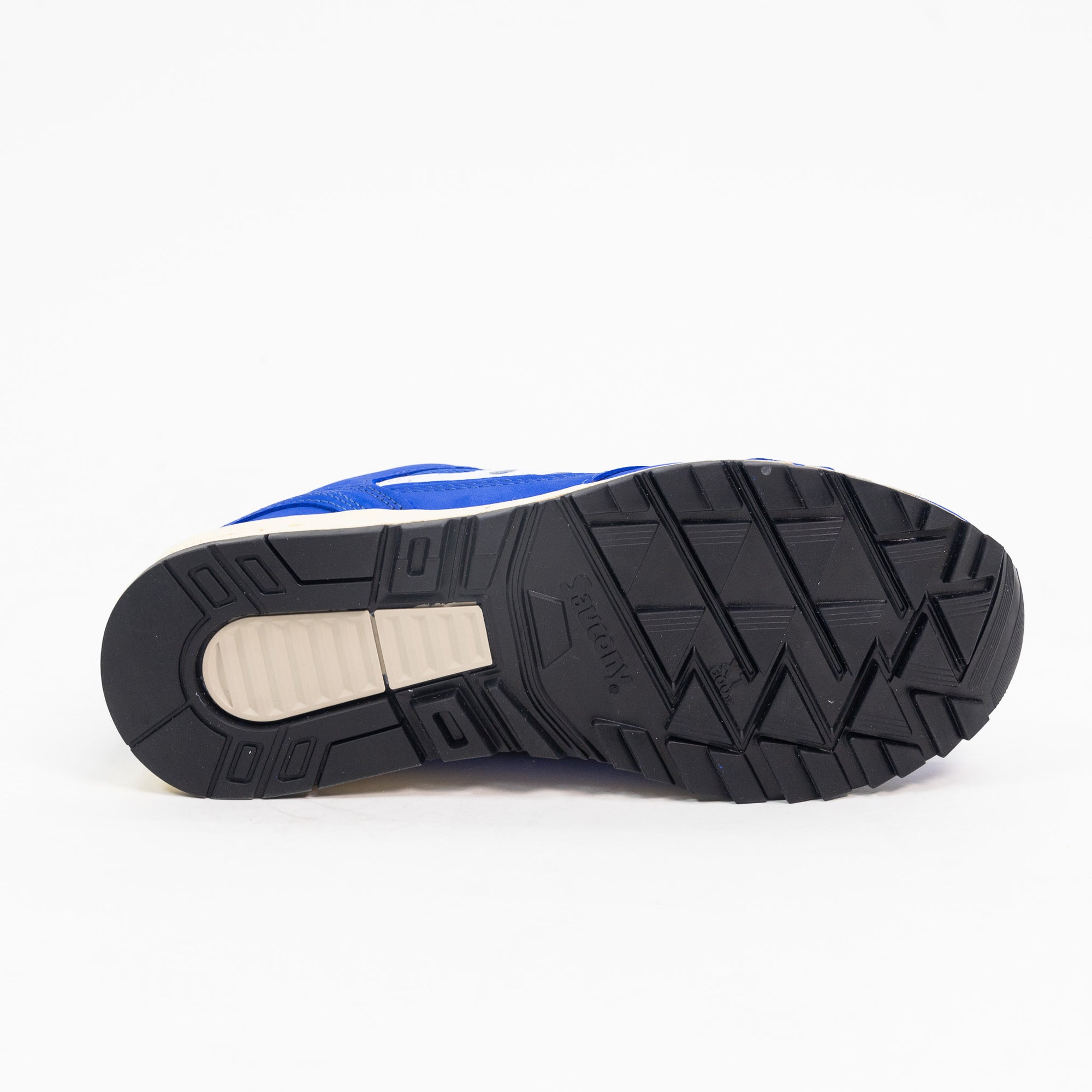 blue saucony shadow 6000 men's comfort shoe with white detail and an off white sole