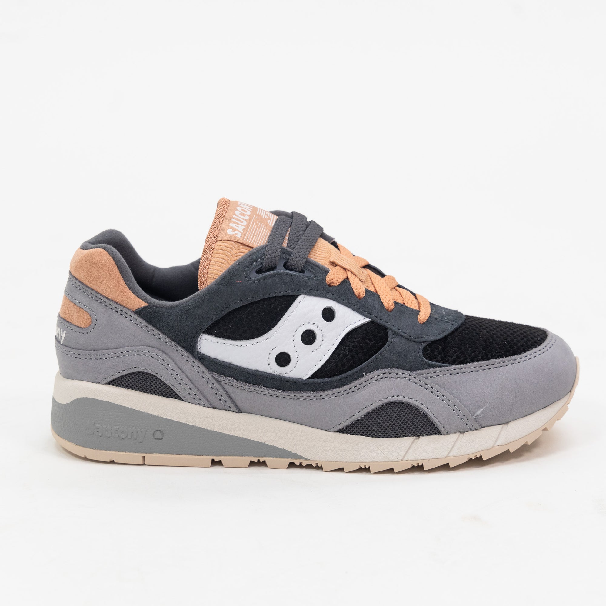 black and grey saucony shadow 6000 women's comfort shoe with pink orange detail and an off white and grey sole