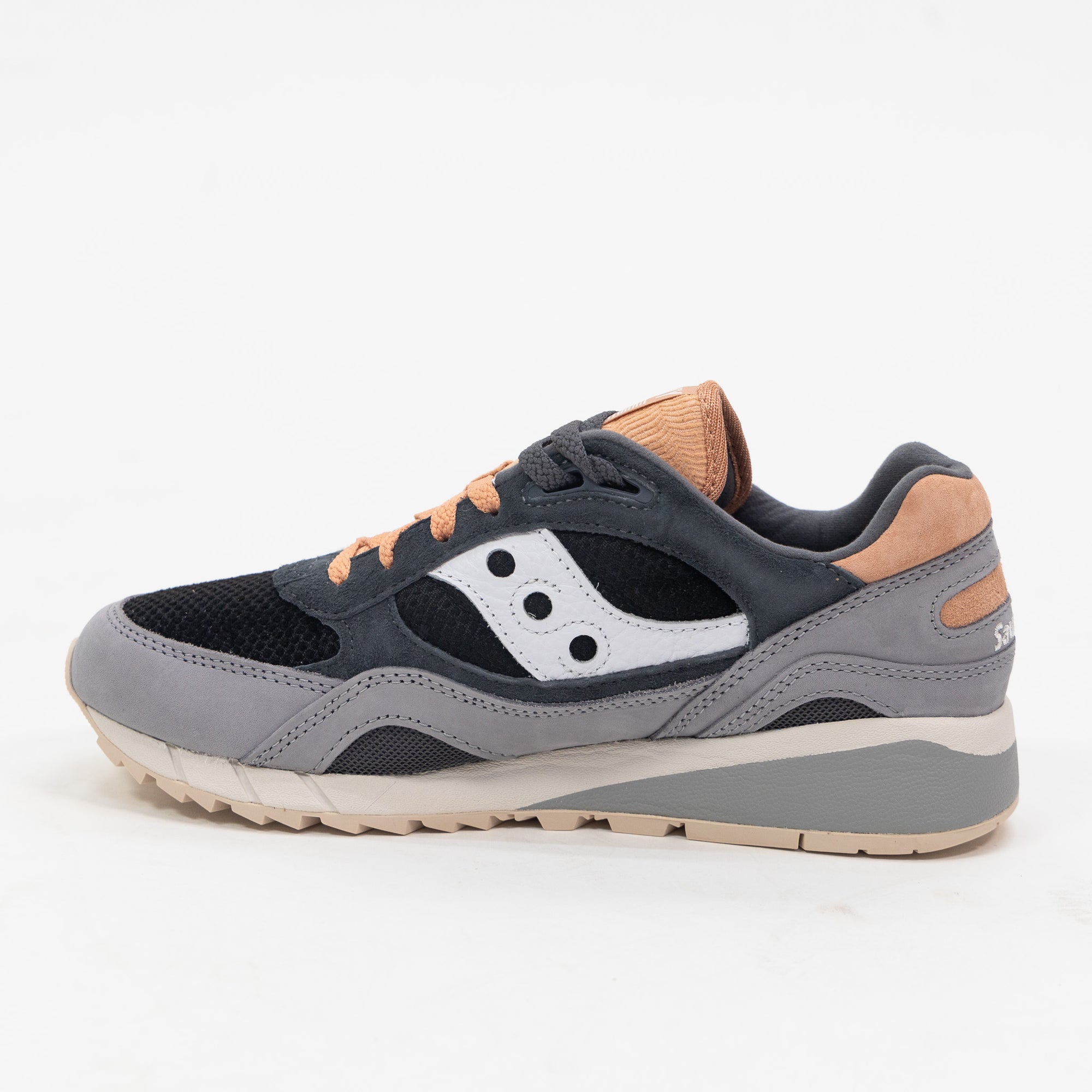 black and grey saucony shadow 6000 women's comfort shoe with pink orange detail and an off white and grey sole