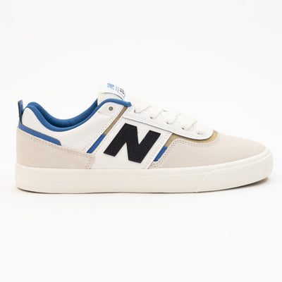 white men's new balance shoe with blue and brown detail