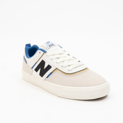 white men's new balance shoe with blue and brown detail