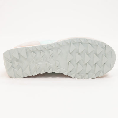 grey and white saucony triple women's stacked sole with mint green and orange details comfort shoe