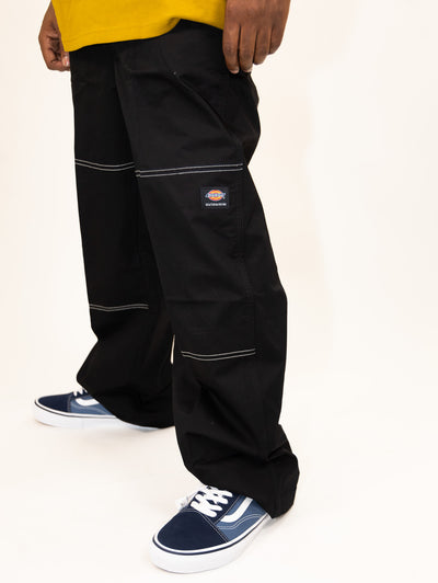 black wide leg dickies pants with white contrast stitching