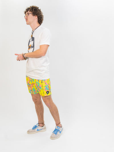 yellow grid and blue and pink floral volcom men's boardshorts