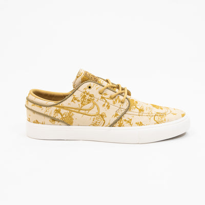 tan and gold city of style nike sb janoski low top men's skate shoe with all over print and white sole