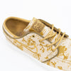 tan and gold city of style nike sb janoski low top men's skate shoe with all over print and white sole