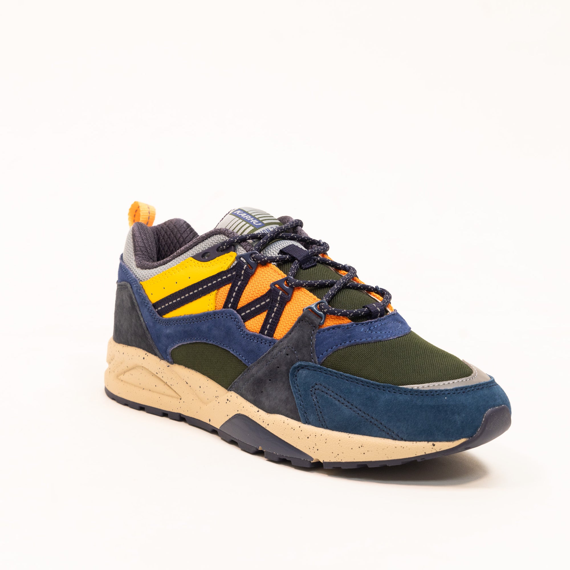 blue karhu men's shoe with green orange and yellow details